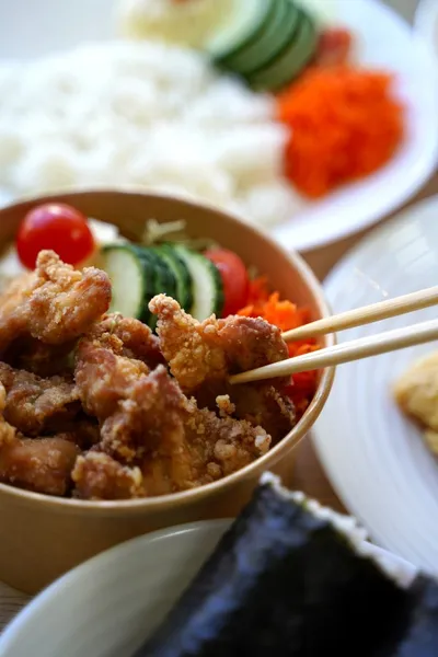 Japanese cuisine from Iyasaka Cafe featuring traditional dishes